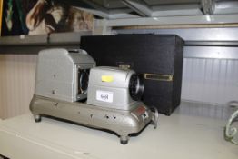 A slide projector in fitted case