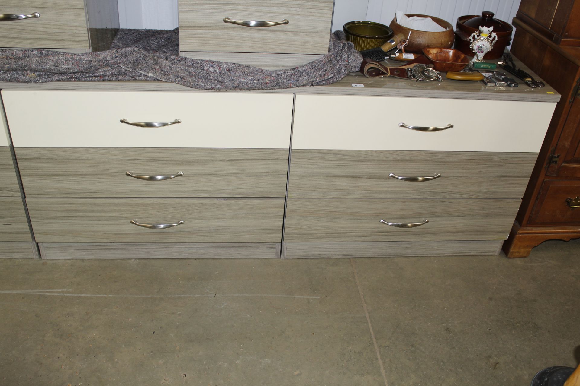 A laminate nine drawer bedroom unit and a pair of - Image 2 of 4