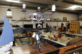 A wrought iron table lamp