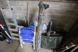 A camouflage print fishing shelter in bag