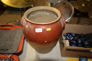 A part glazed stoneware twin handled pot