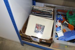 A box of various records to include Paul Simon etc