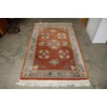 An approx. 7' x 4'1" floral patterned rug