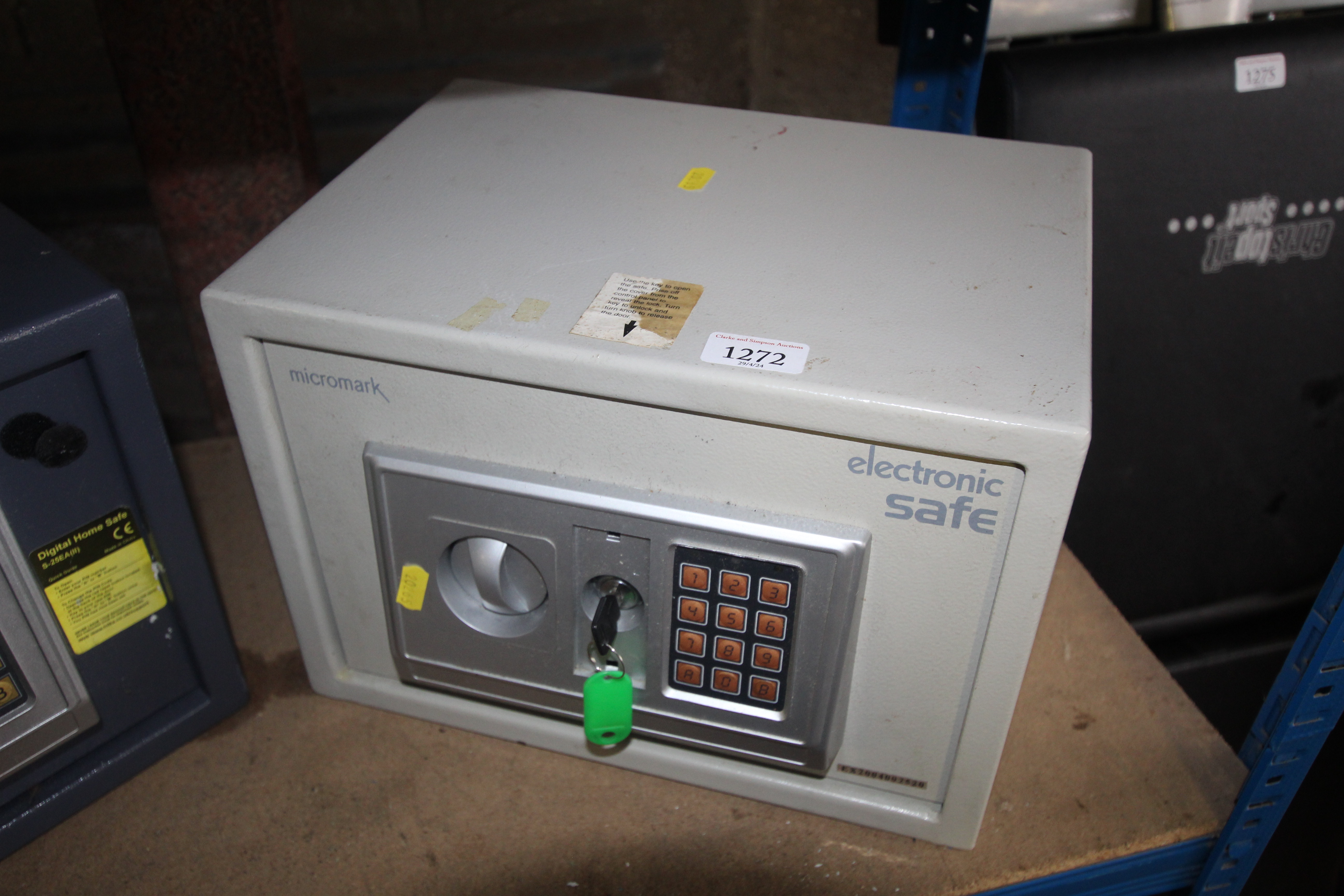 A Micromark electronic safe with key