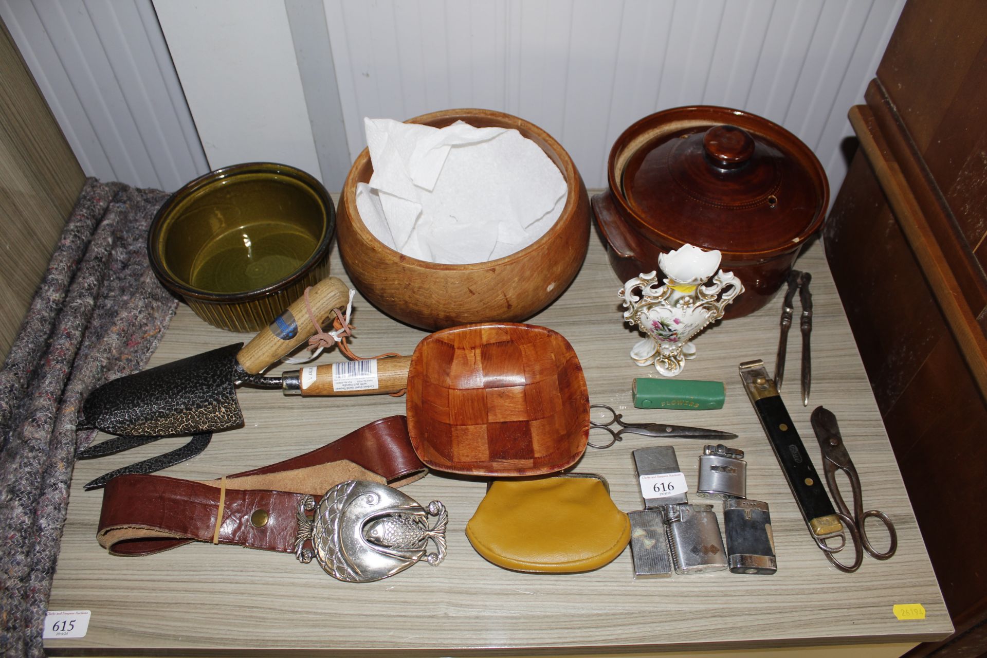 A collection of miscellaneous items including ciga