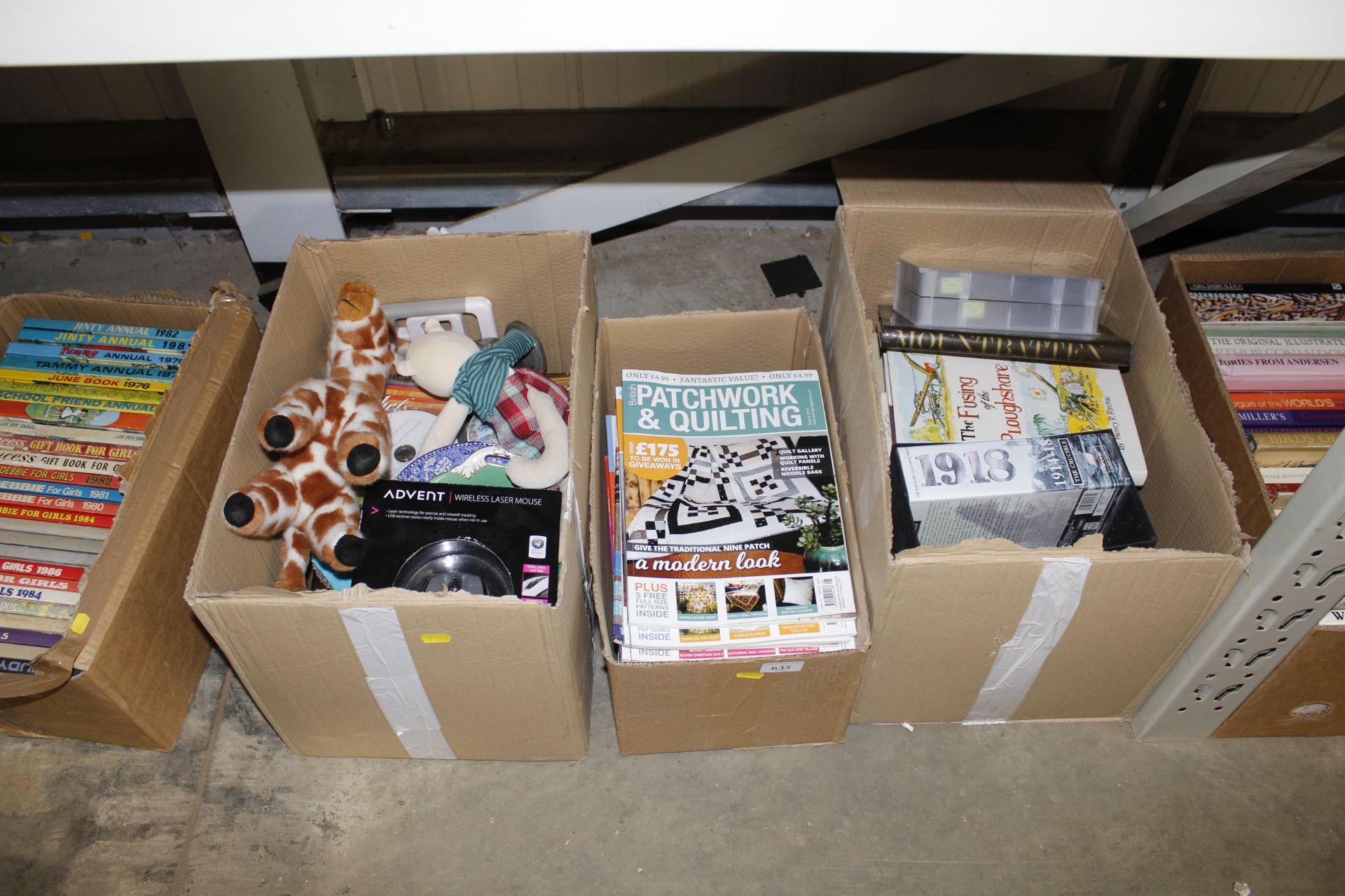 A box of miscellaneous books, a box of quilting ma