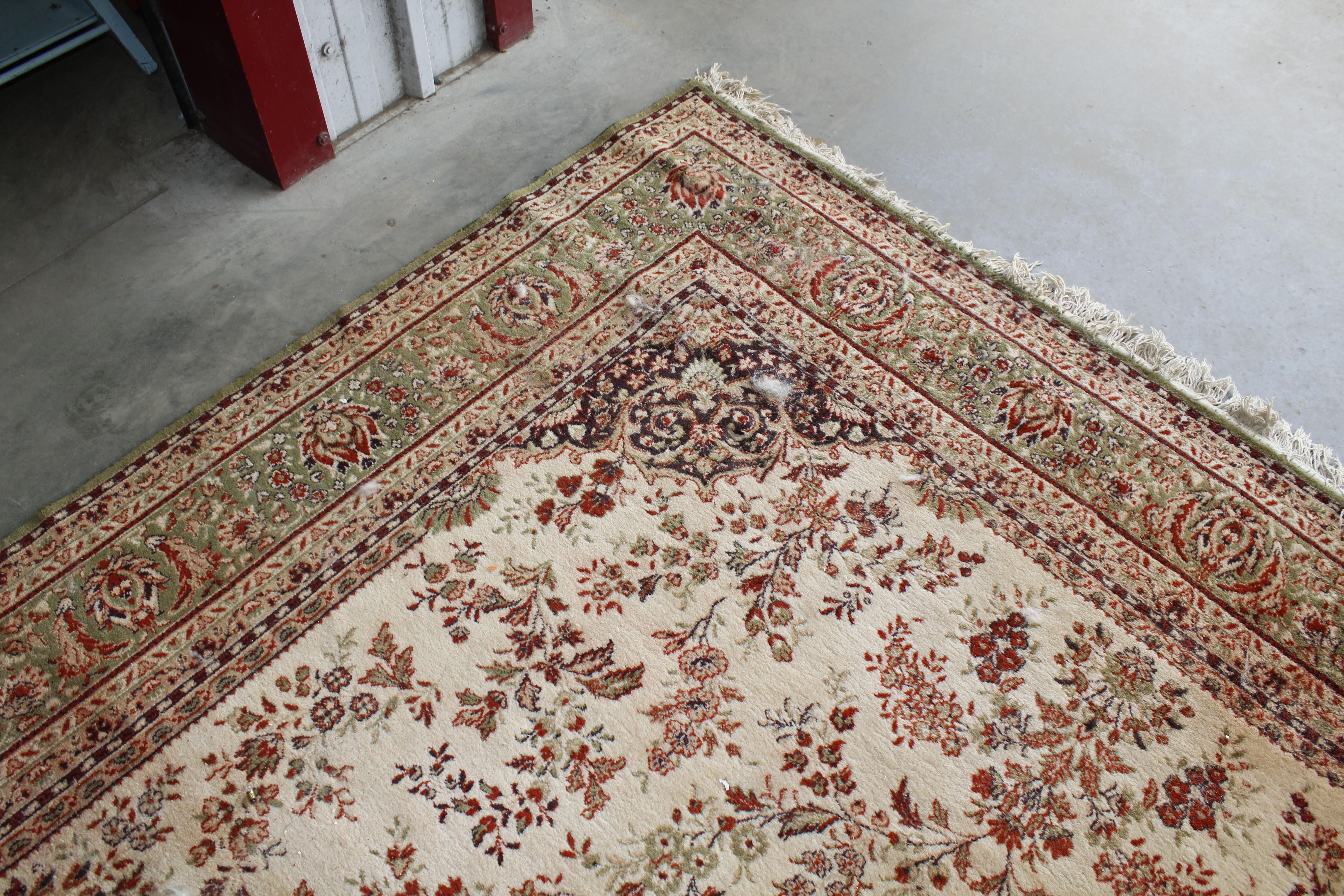 An approx. 11'7" x 8'1" green patterned rug AF - Image 5 of 7