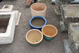 A pair glazed plant pots; a blue glazed planter an