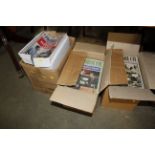 Two boxes containing Private Eye magazines