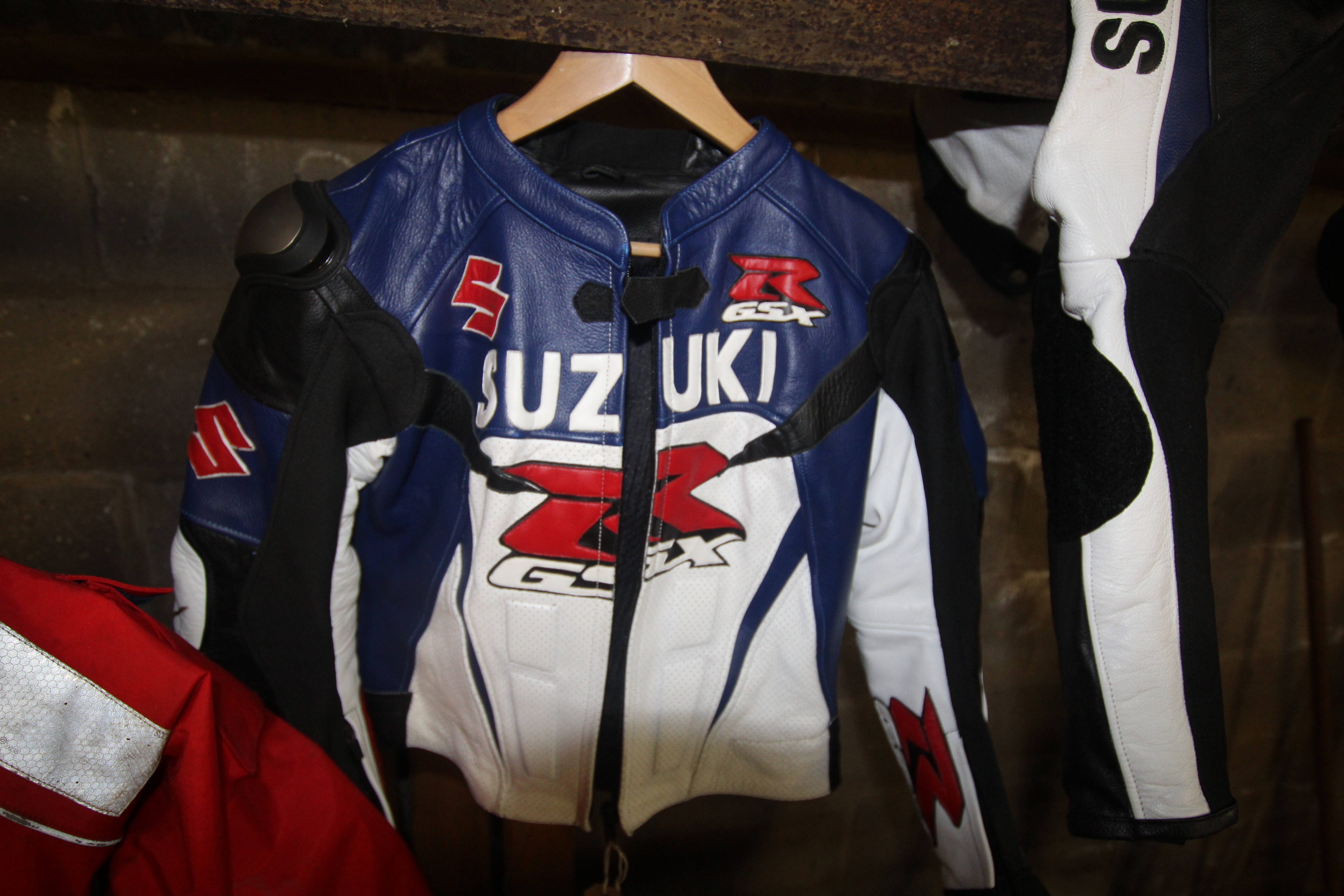 A two piece set of Suzuki GSXR motorcycle leathers (Jacket size - small Adult, Trouser size -med./ - Image 2 of 3