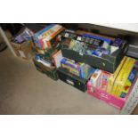 Five boxes containing board games