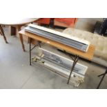 A Brother knitting machine and table