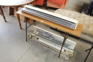 A Brother knitting machine and table