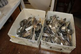 two boxes of various cutlery