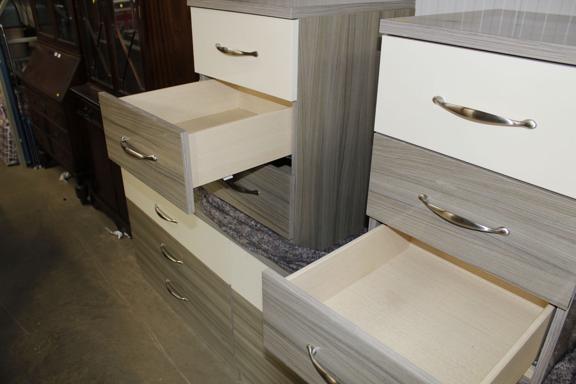 A laminate nine drawer bedroom unit and a pair of - Image 4 of 4