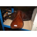 A leather riding saddle