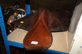 A leather riding saddle
