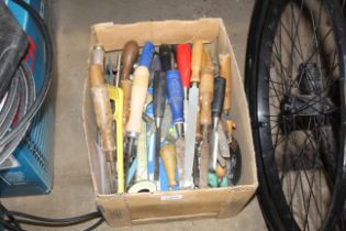 A box containing a large quantity of hand tools to