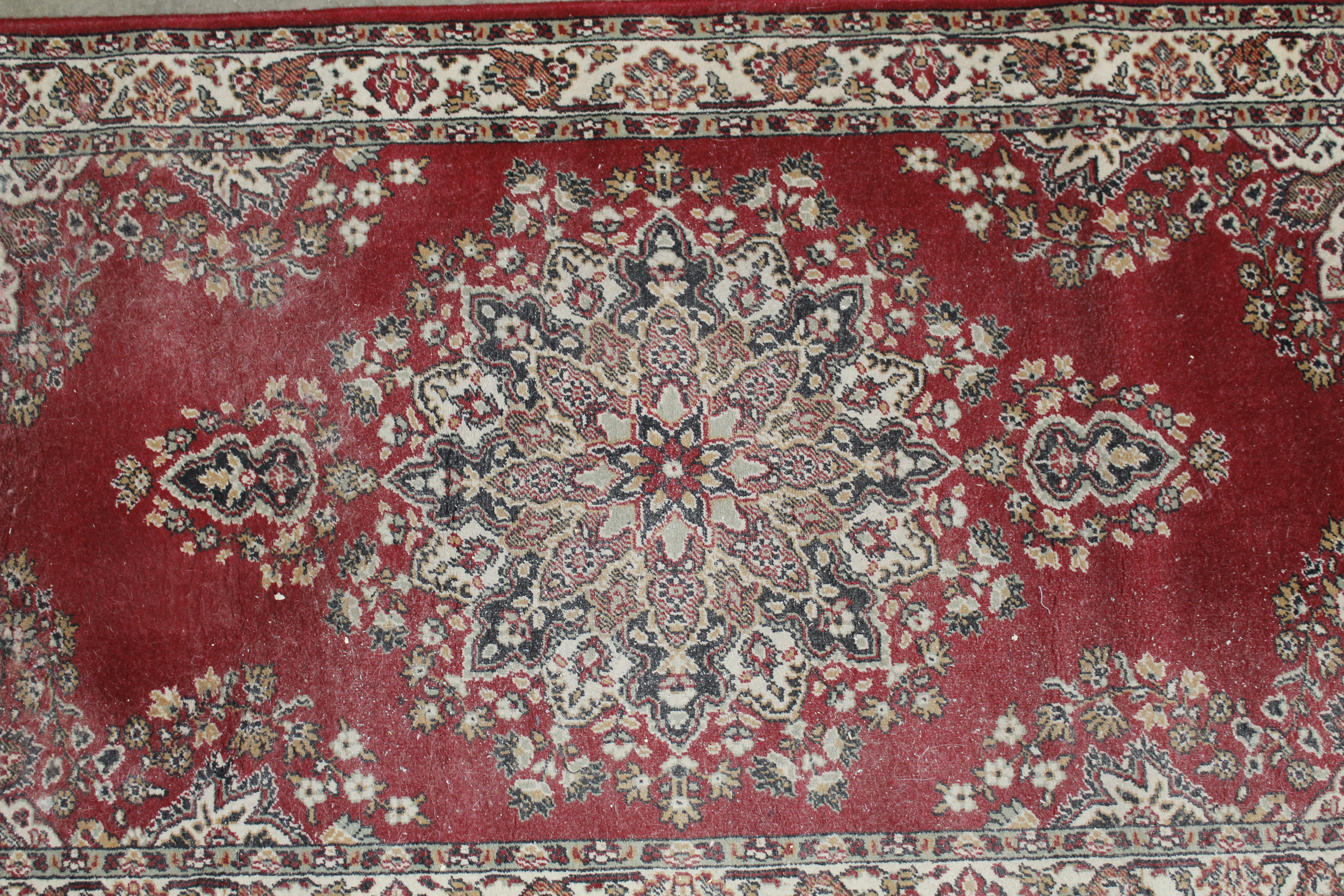 An approx. 5'7" x 2'7" floral patterned rug AF - Image 2 of 6
