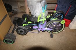 Two children's skid steer low slung pedal tricycle