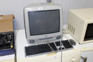 An Apple iMac computer keyboard and mouse