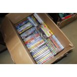 A box of various DVDs