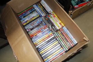 A box of various DVDs