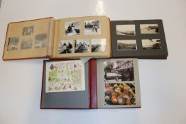 Three albums of post-cards and photographs