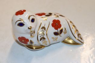 A Royal Crown Derby paperweight in the form of a s
