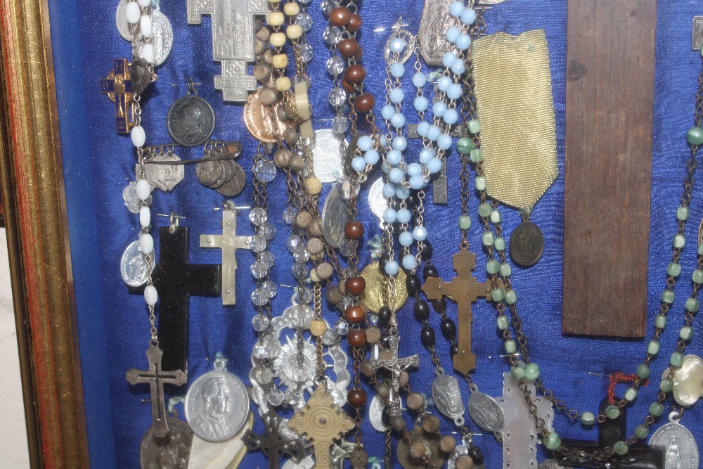 A display case of Papal medallions; rosary beads; - Image 10 of 13