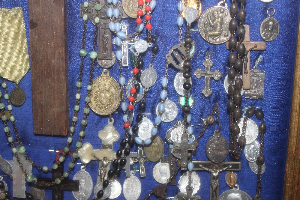 A display case of Papal medallions; rosary beads; - Image 9 of 13