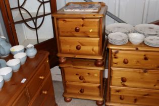 A pair of modern pine bedside chest fitted two dra