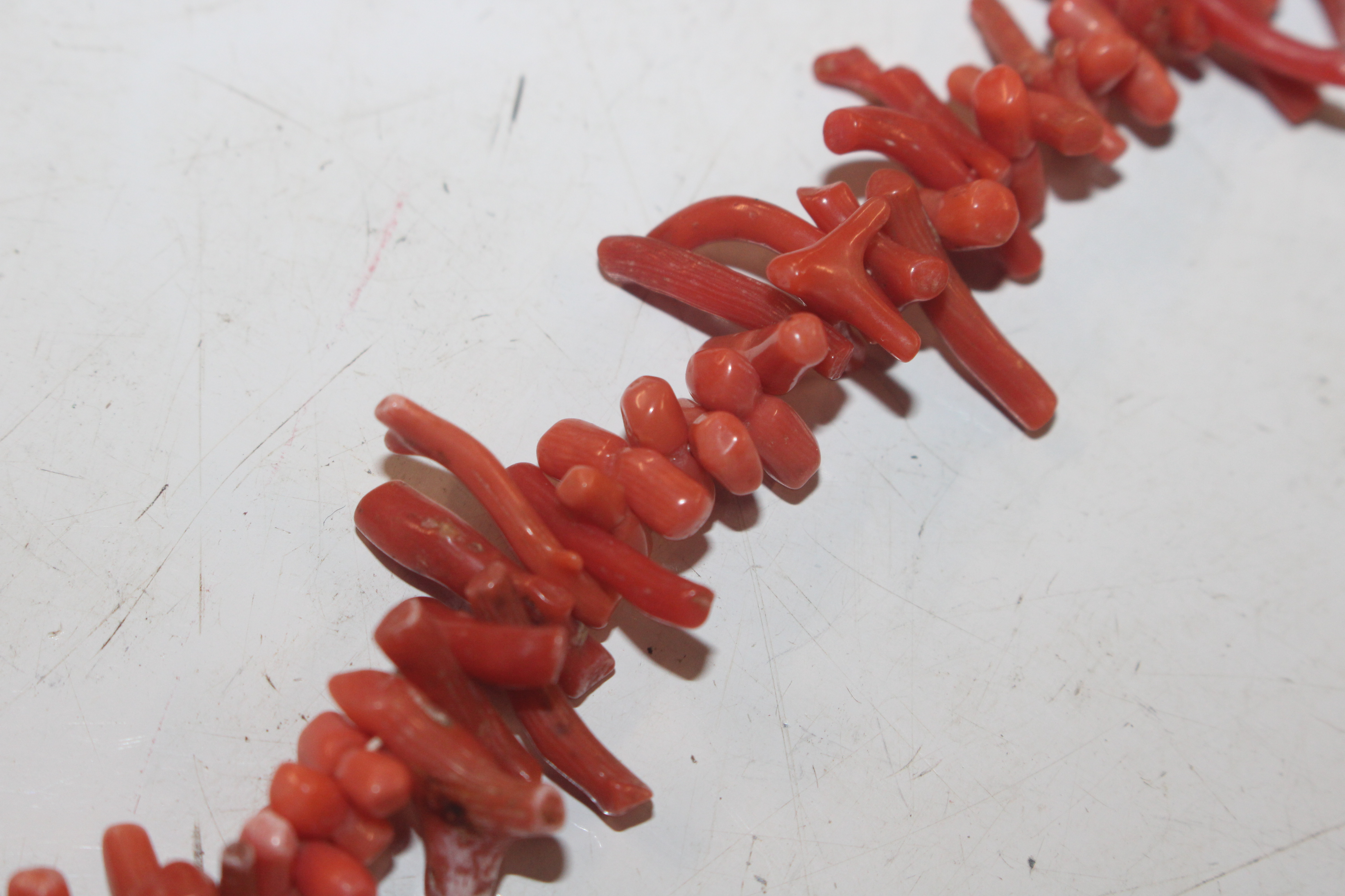 A box of jewellery to include coral necklace, yell - Image 8 of 11