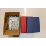 Two stamp albums and part contents and a box of lo