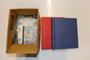 Two stamp albums and part contents and a box of lo