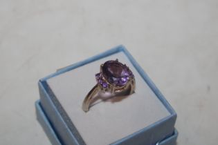 A Sterling silver and amethyst set ring, ring size