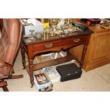 A Victorian mahogany table fitted two drawers, rai