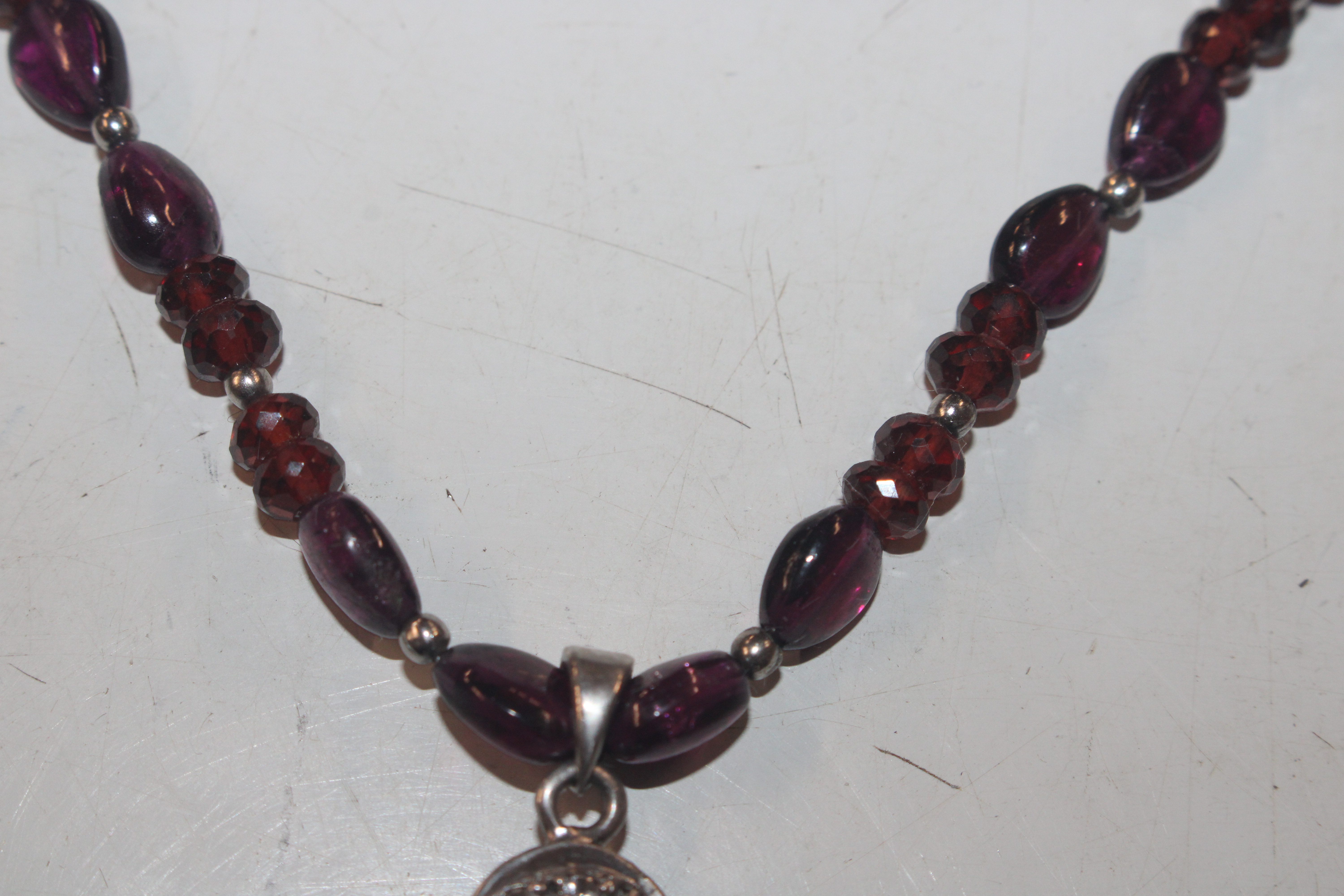 A Sterling silver garnet and white sapphire neckla - Image 8 of 11