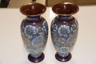 A pair of Royal Doulton floral and gilt decorated