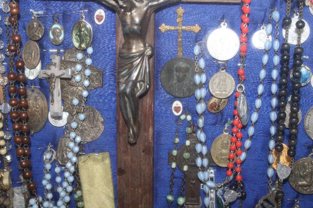 A display case of Papal medallions; rosary beads; - Image 7 of 13