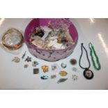 A case containing various costume jewellery