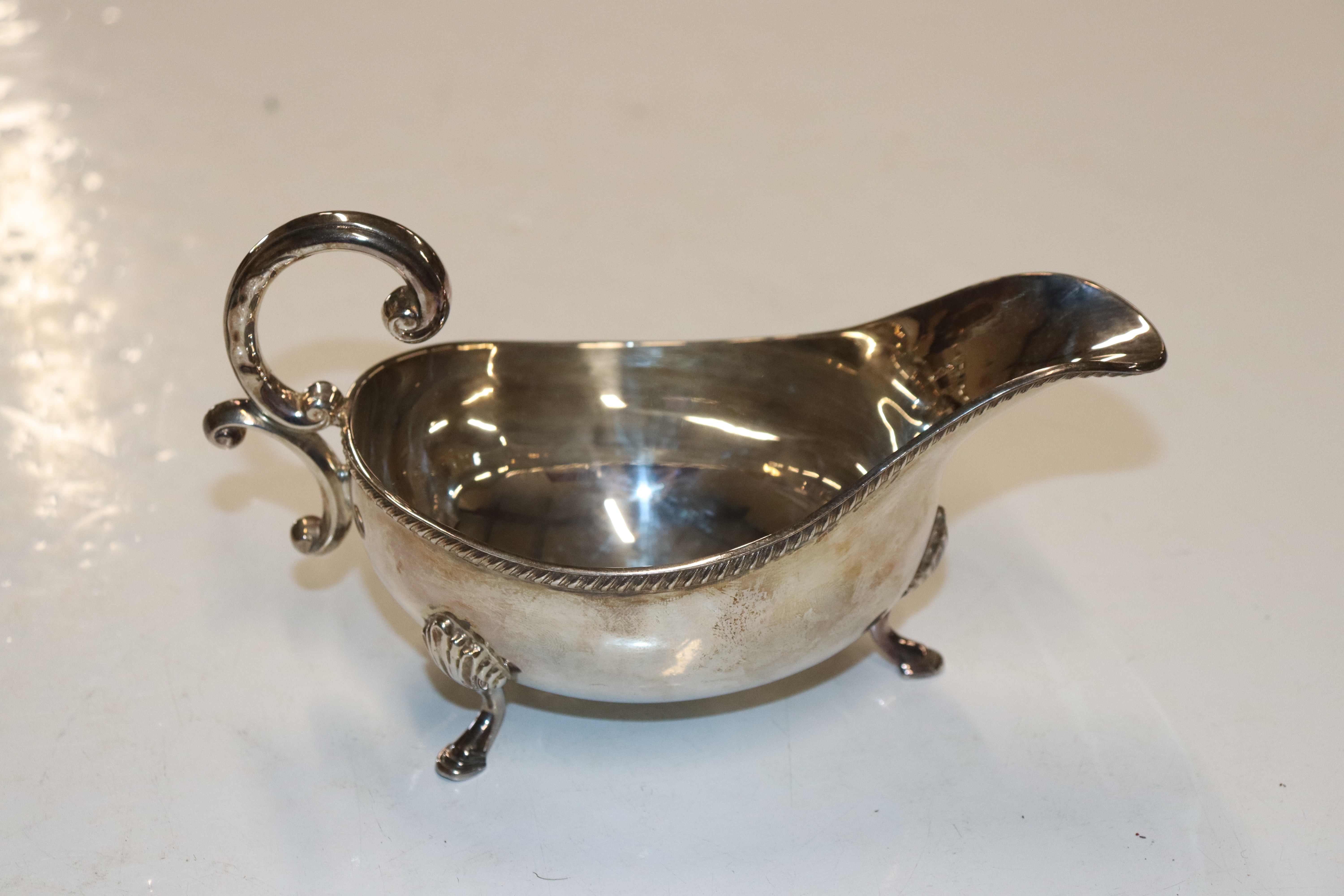 A pair of silver sauce boats with scroll handles, - Image 3 of 11