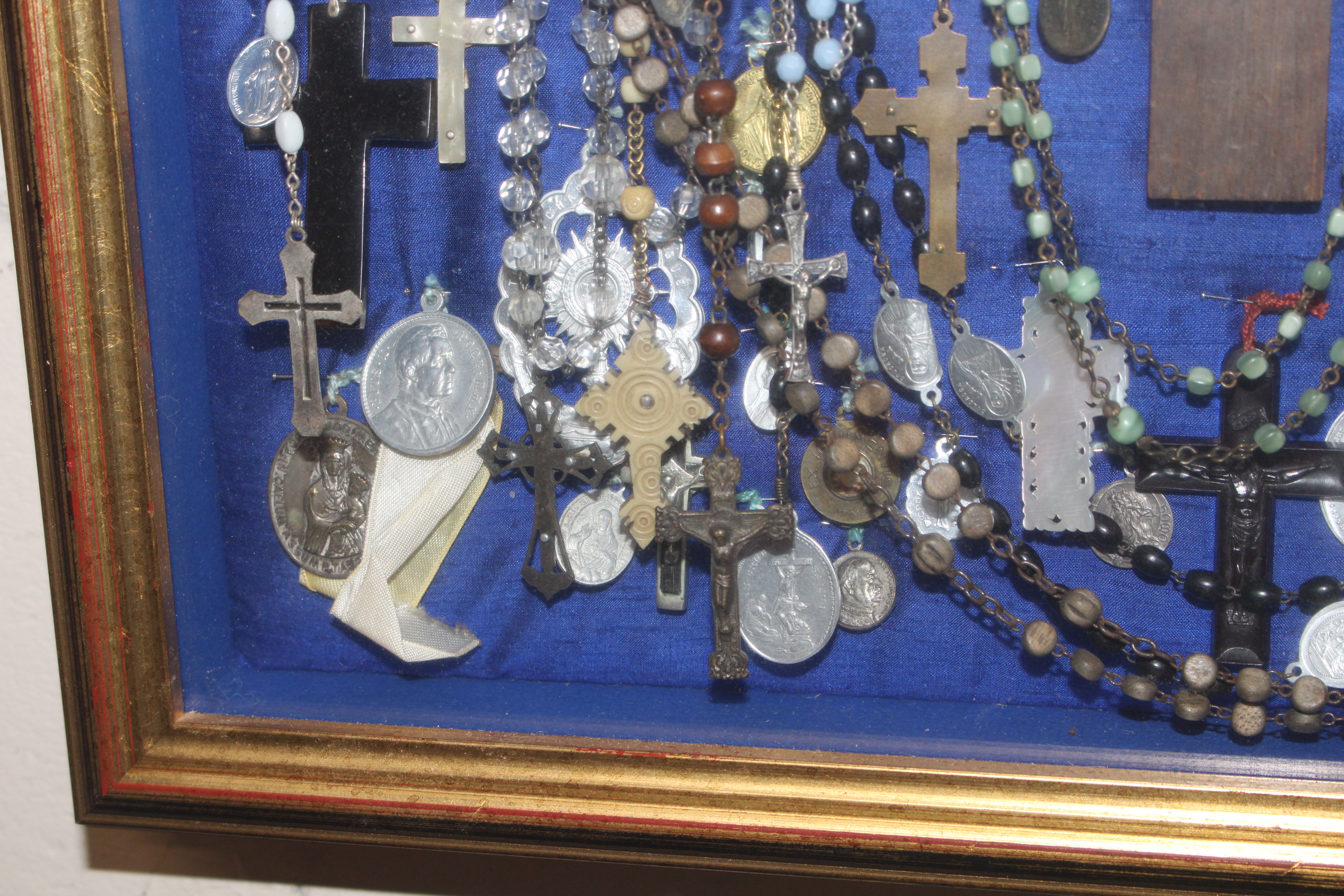A display case of Papal medallions; rosary beads; - Image 11 of 13