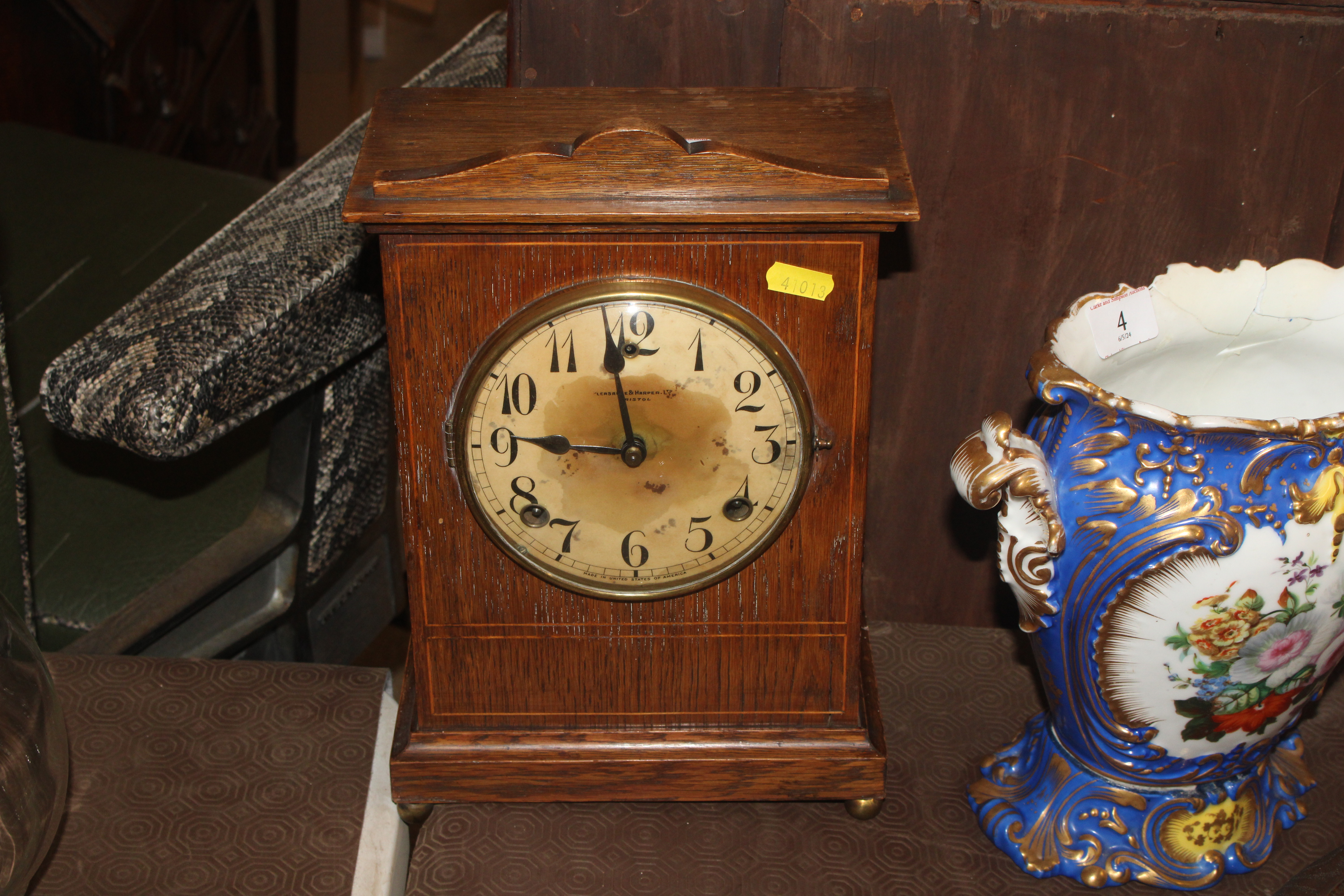 A Laurence & Harper of Bristol oak cased mantel cl