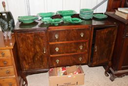 A mahogany sideboard fitted three central drawers,