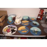 A quantity of decorative bowls and plates