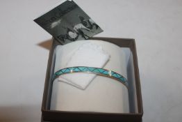An American Indian Sterling silver and turquoise b