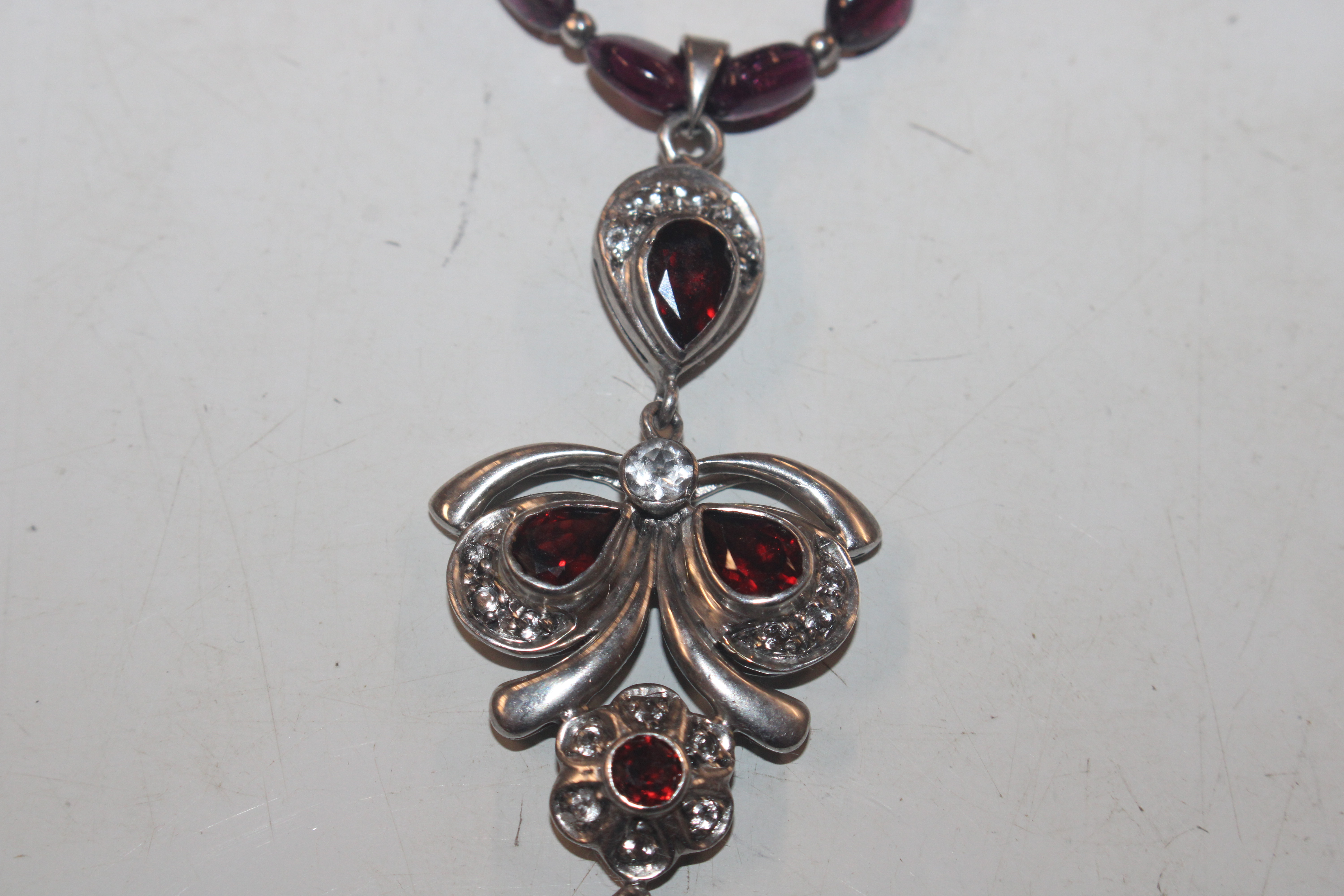 A Sterling silver garnet and white sapphire neckla - Image 7 of 11