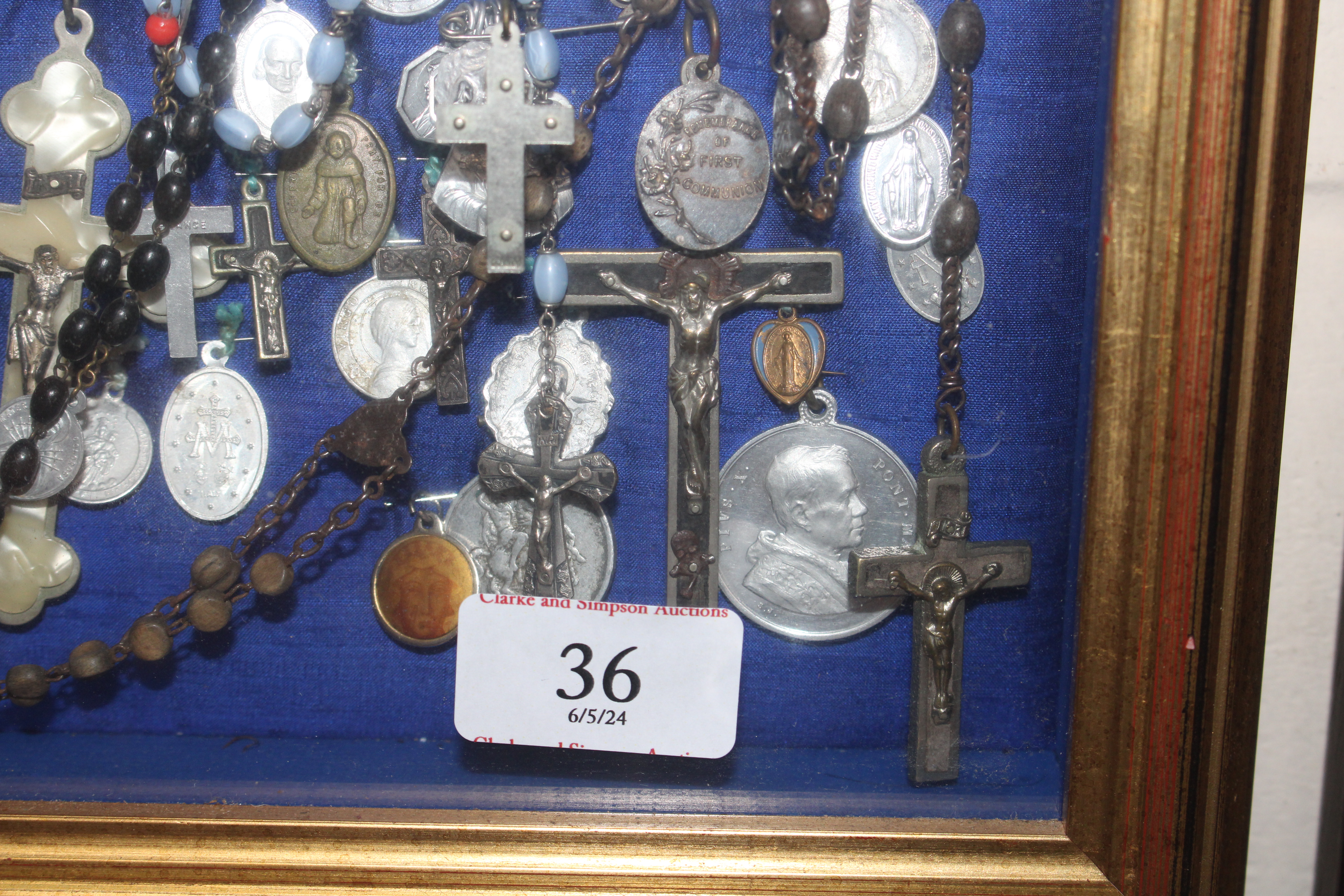 A display case of Papal medallions; rosary beads; - Image 13 of 13