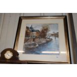 A large framed coloured print of a river scene